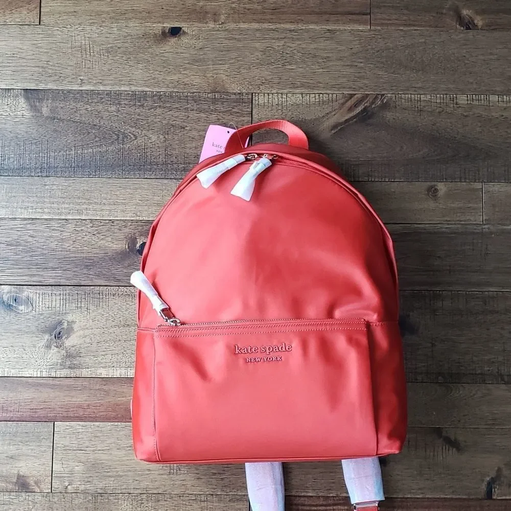 Kate Spade large orange nylon backpack